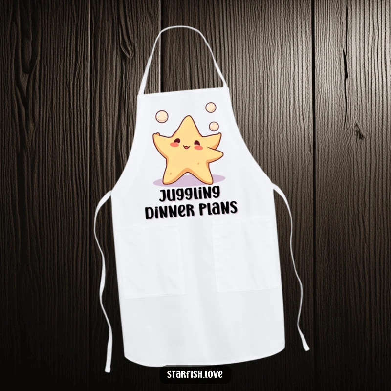An apron featuring a cute starfish character juggling three pearls, designed for kitchen use by those who love the ocean and a playful touch.