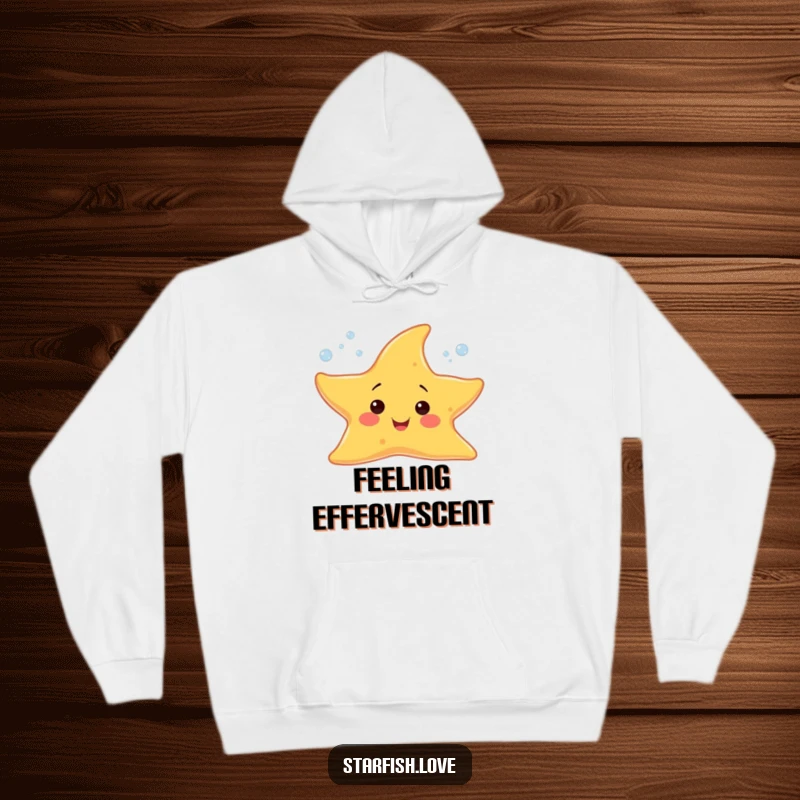 Funny hoodie featuring a cheerful starfish character blowing tiny, sparkling bubbles, perfect for spreading bubbly happiness.