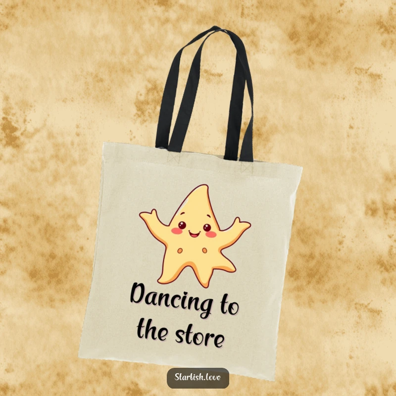 Funny tote bag depicting a smiling starfish character dancing with flowing arms, ideal for carrying essentials with flair.